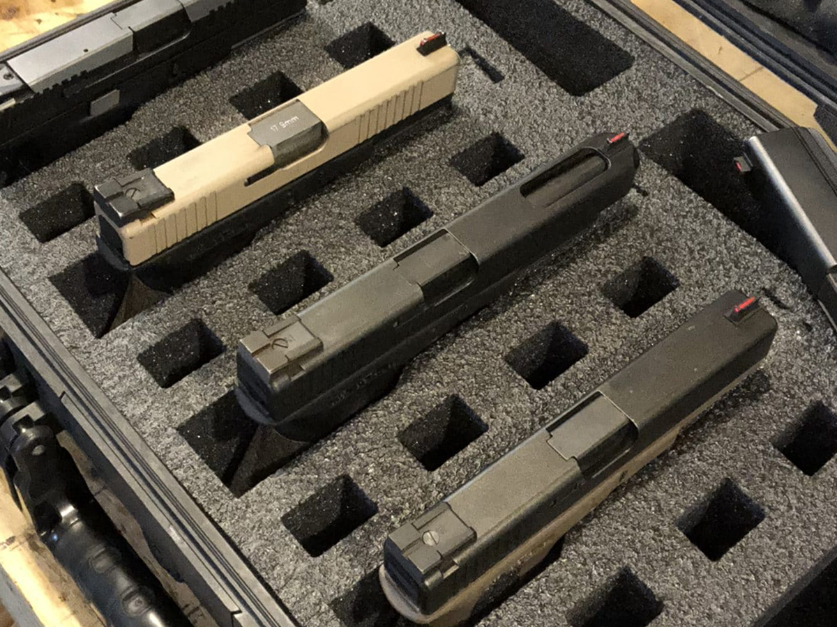 image of guns in a foam case